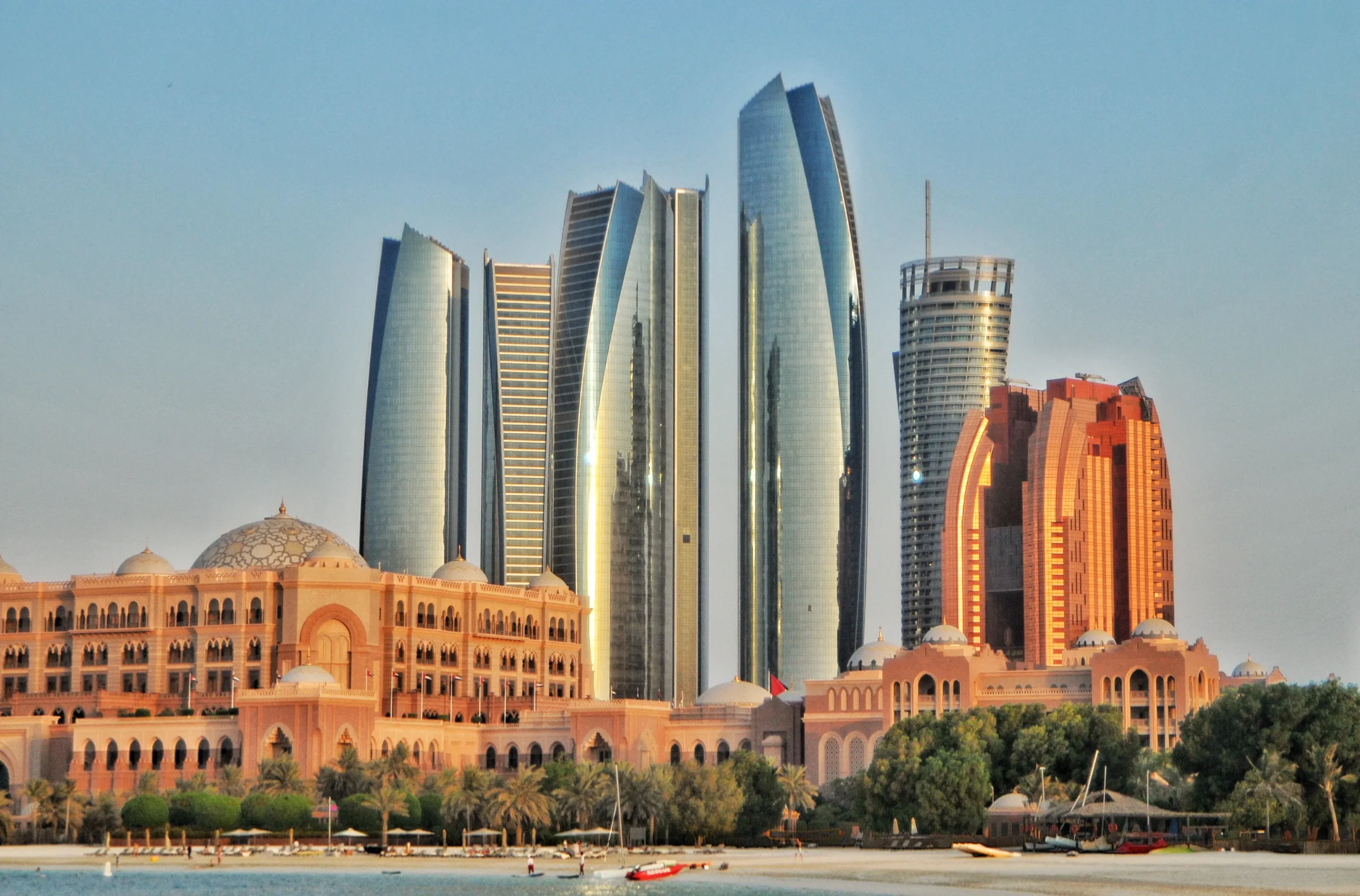 Abu Dhabi skyline and Emirates Palace at golden hour